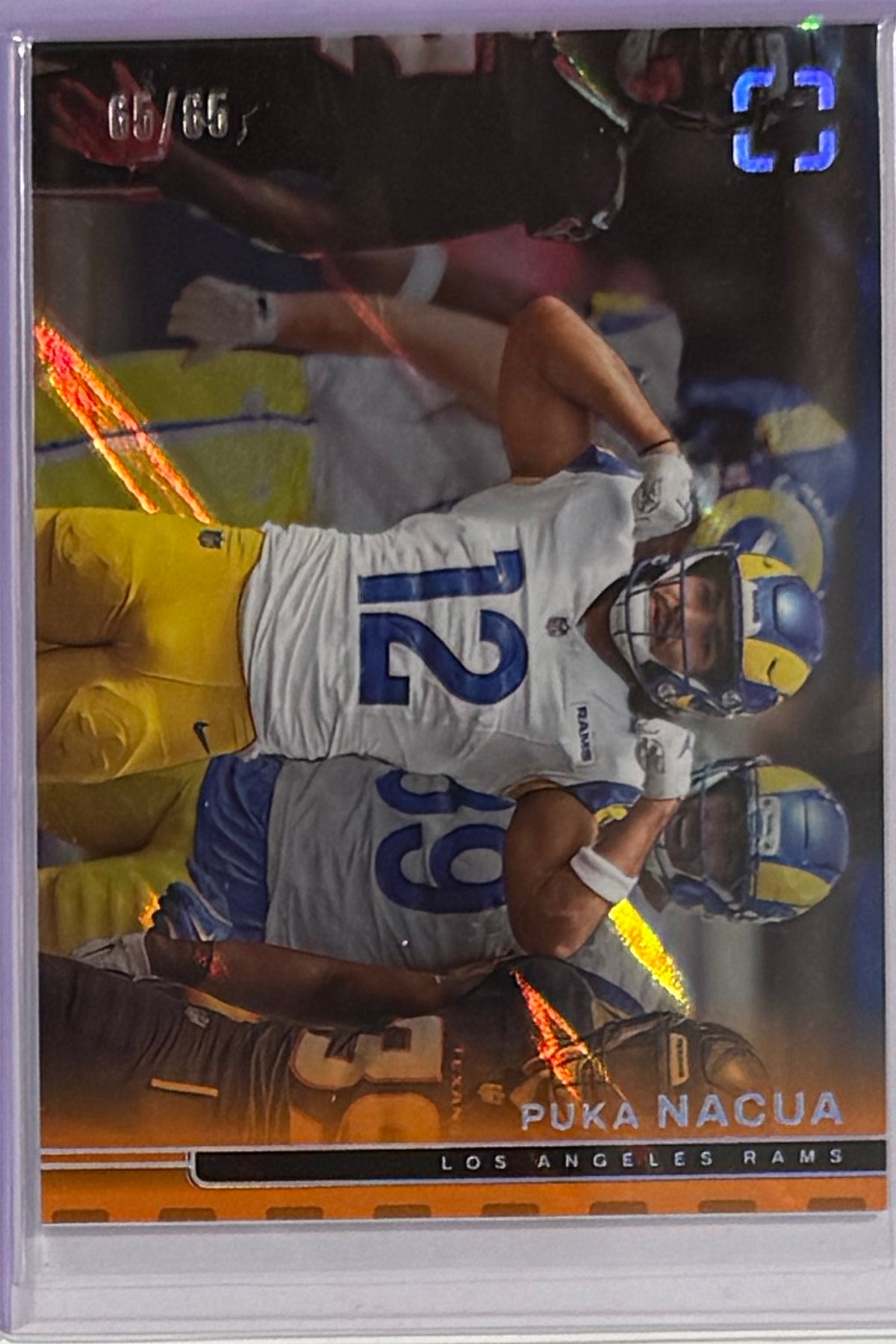 2025 Puka Nacua — PhotoGenic [Orange] — front — Inventory P085-C