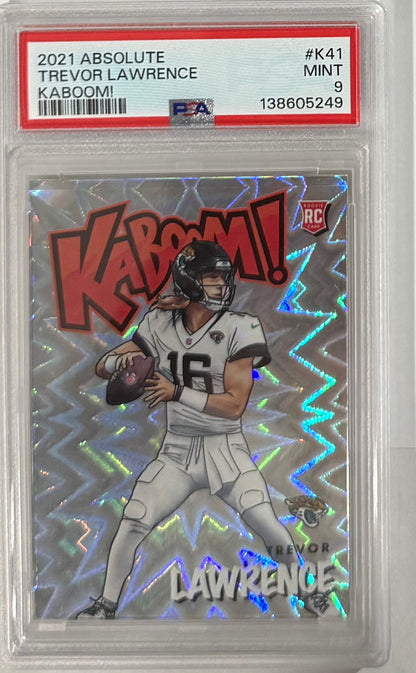 2021 Trevor Lawrence — Absolute Kaboom — PSA 9 — front — Inventory P102-C