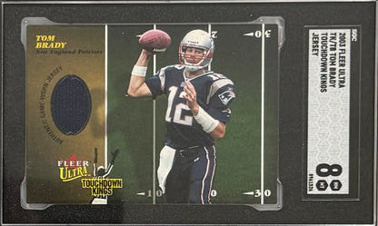 2003 Tom Brady — Fleer Ultra Touchdown Kings [Jersey] — SGC 8 — front — Inventory P300-A