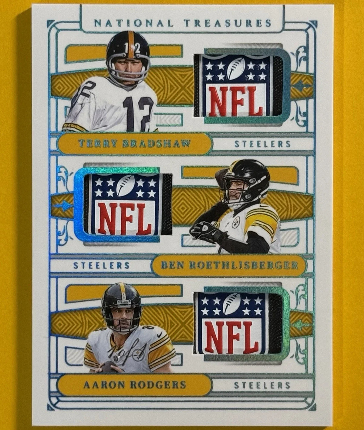 P716-D — National Treasures Bradshaw / Roethlisberger / Rodgers Triple NFL Shield 1/1 — front
